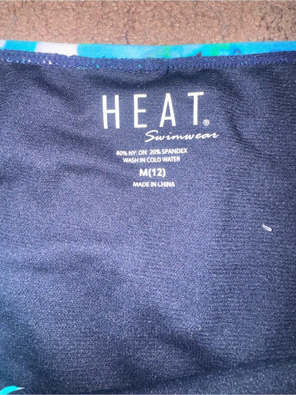 HEAT Swimwear Black Swimsuit Bottom with Teal Trim